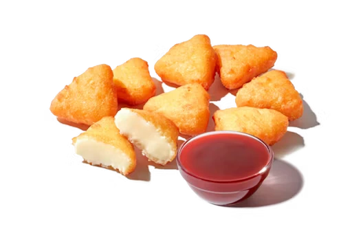 Fried Cheesecake bites with Strawberry Sauce at Zaxbys